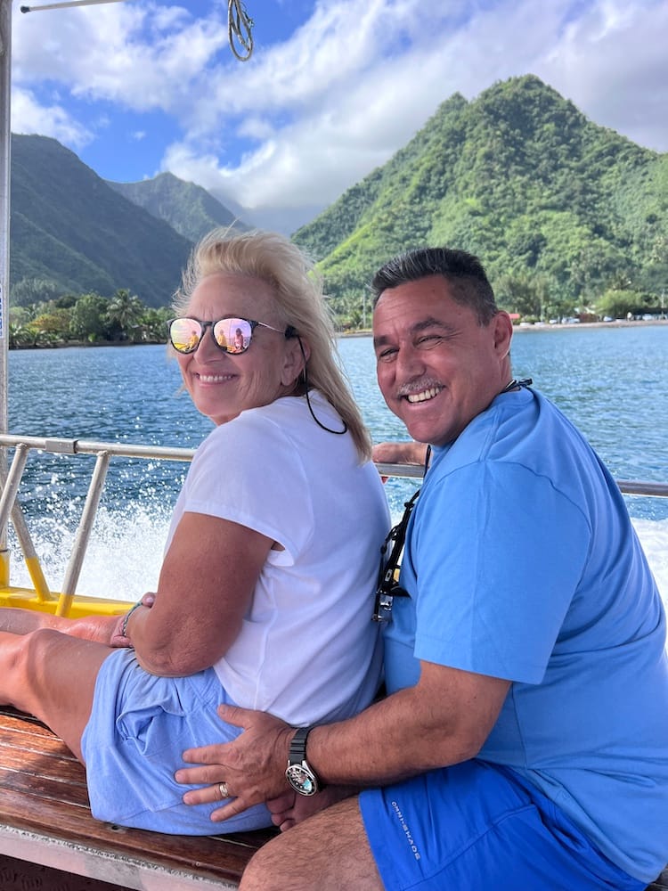 A Couple Enjoying the Teahupoo Waves