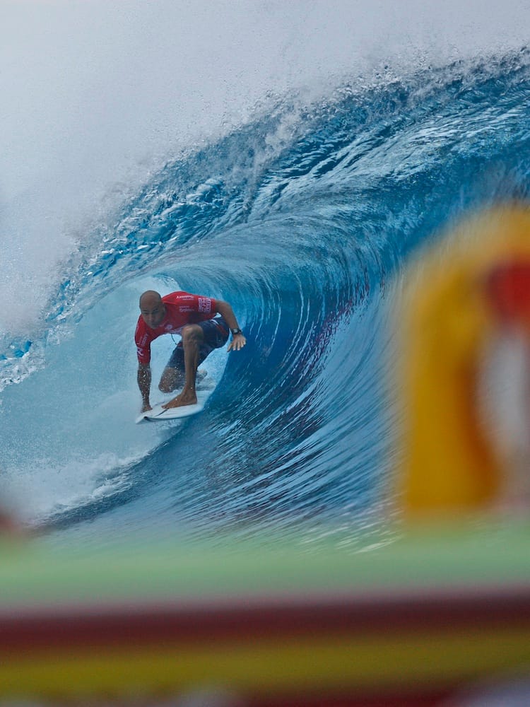 Surfing Teahupoo Waves