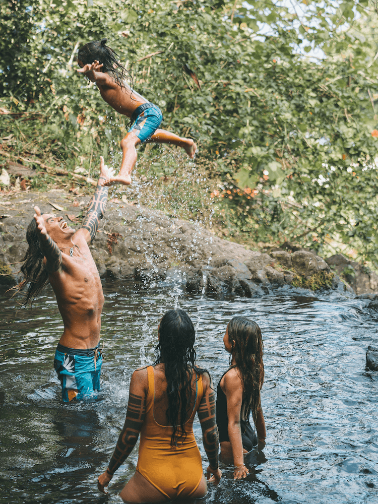 Unique Tahiti - Tours of Tahiti - Family Playing in the Water