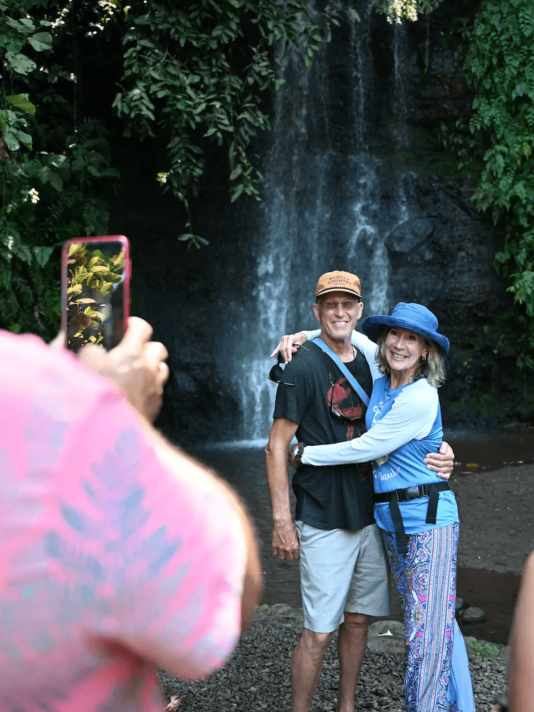 West Cost Full Day Tour of Tahiti - Couple Posing for Photos in Front of Waterfall