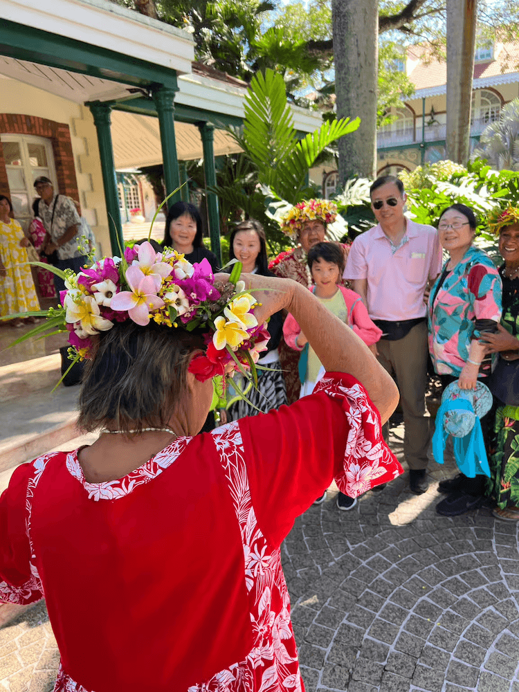 West Cost Full Day Tour of Tahiti - Family Posing for Photos with Locals