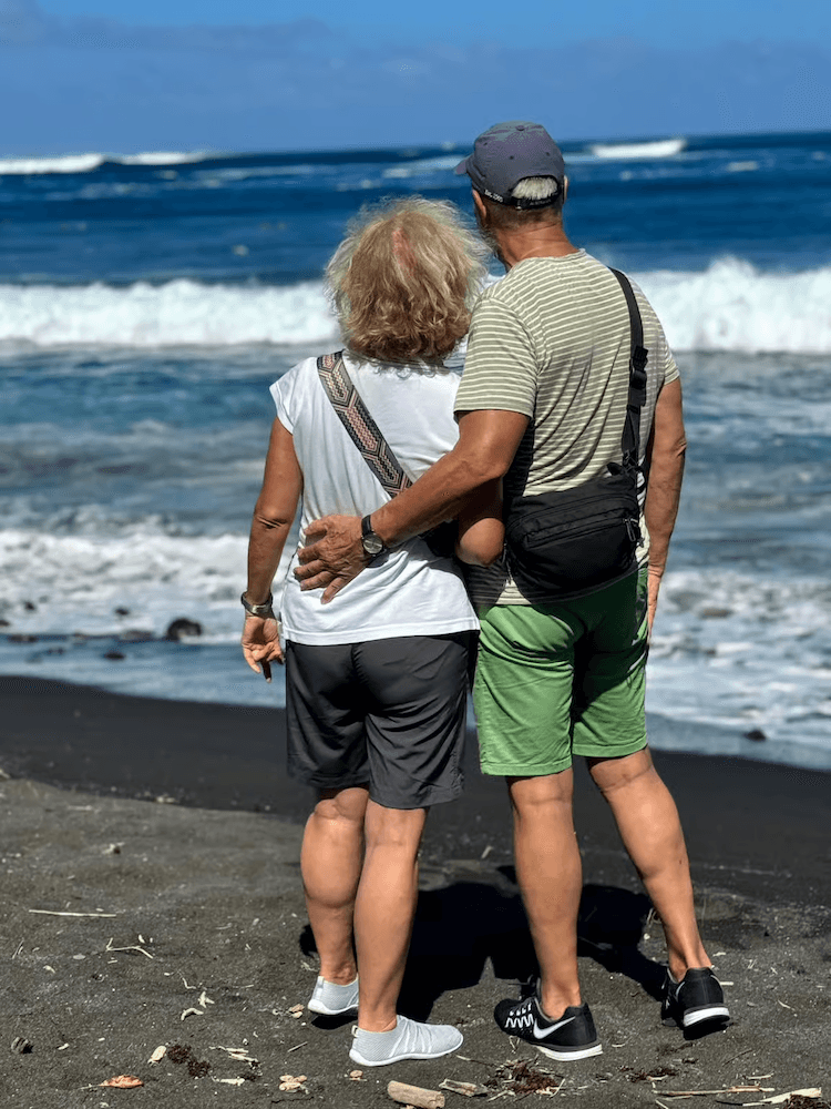 West Cost Half Day Tour of Tahiti - Couple Taking in the Beautiful Waves