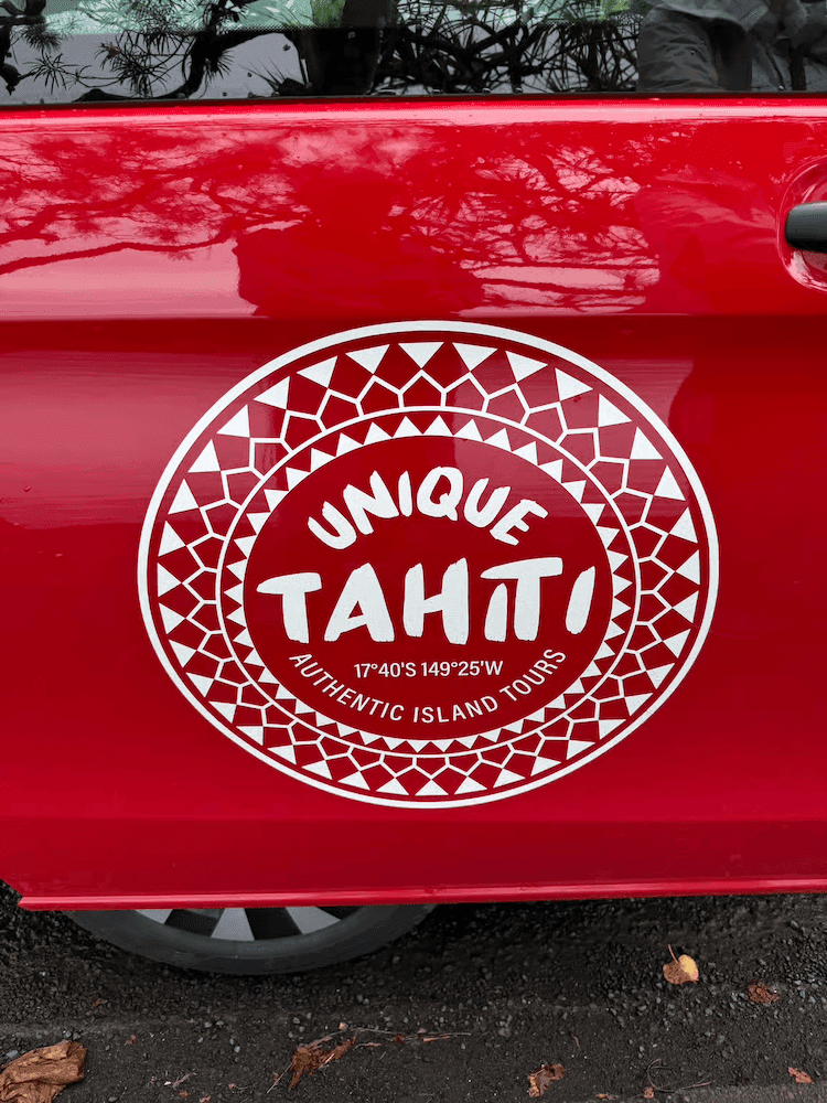 West-Cost-Full-Day-Tour-of-Tahiti-Red-Van-Close-Up.png