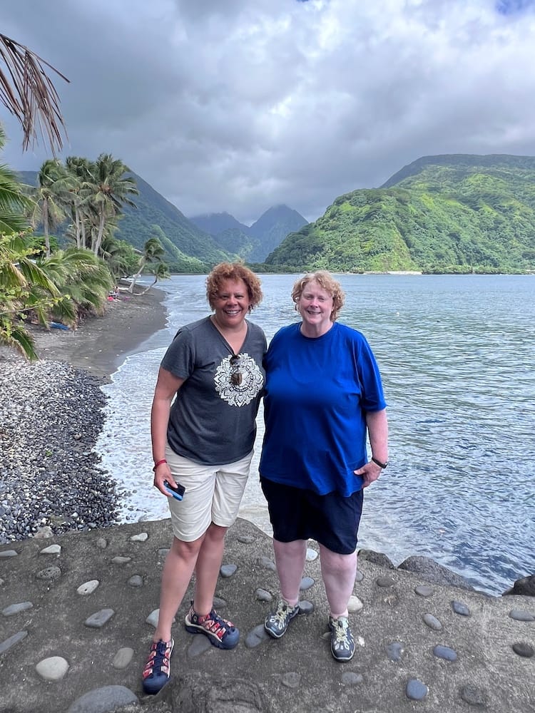 East Coast Tour of Tahiti - Tourists on the Beach in Front of Mountains
