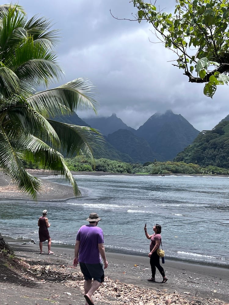 East Coast Tour of Tahiti - Tourists on the Black Sand Beach